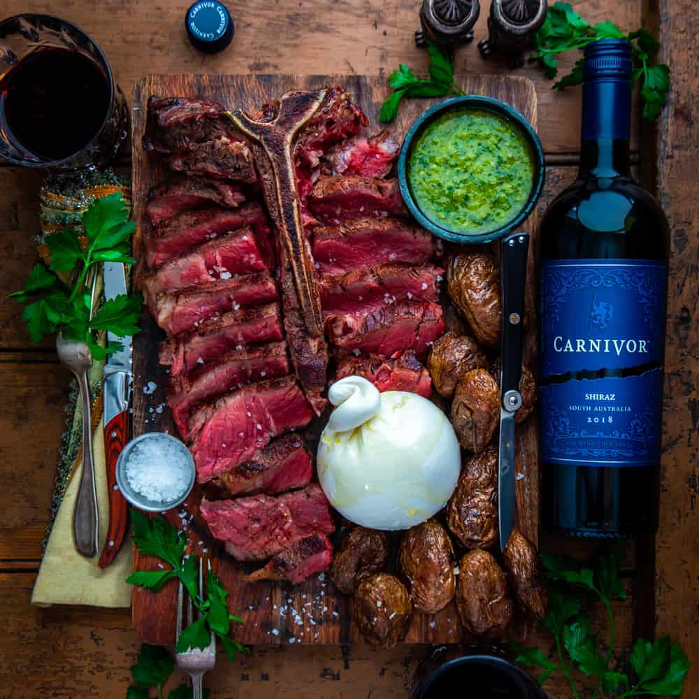 Dennis-Prescott-porterhouse-steak Dennis’ Grilled Porterhouse with Herbed Potatoes, Burrata, Basil Vinaigrette and Carnivor Shiraz