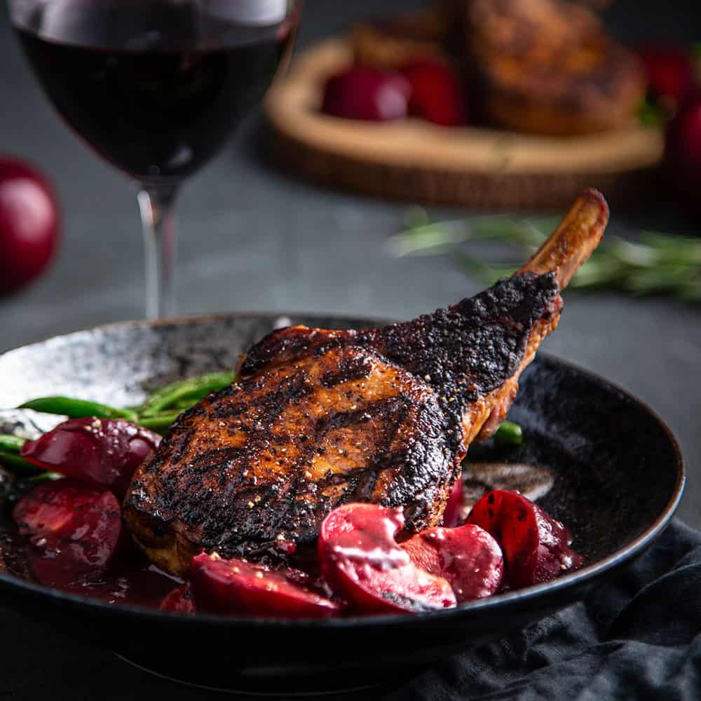 Pork Chops with Roasted Plums in Carnivor Shiraz Reduction